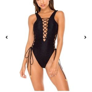 Luli Fama black one piece swimsuit